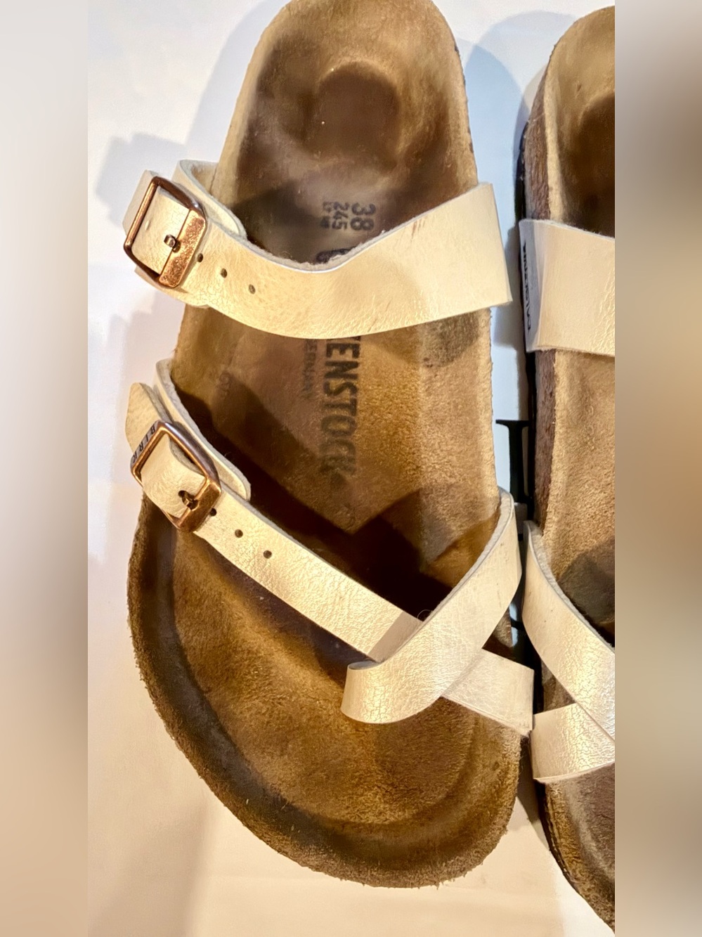 Birkenstock Metallic Cream Cross-Strap Sandals with Rose Gold Buckles - Picture 13 of 14
